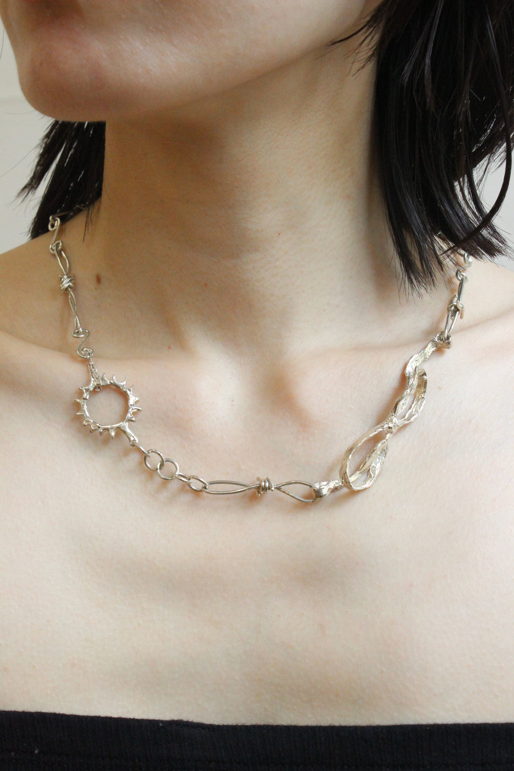 Ribbon and sun necklace